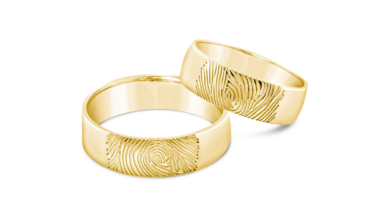 Zlatarna Dodić Fingerprint wedding rings on white surface